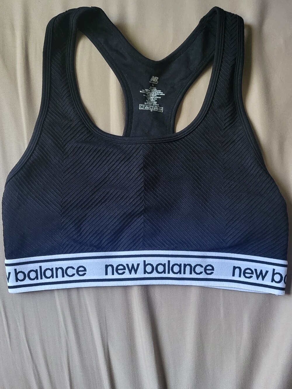 New Balance Black Racerback Sports Crop with Branded White Underband